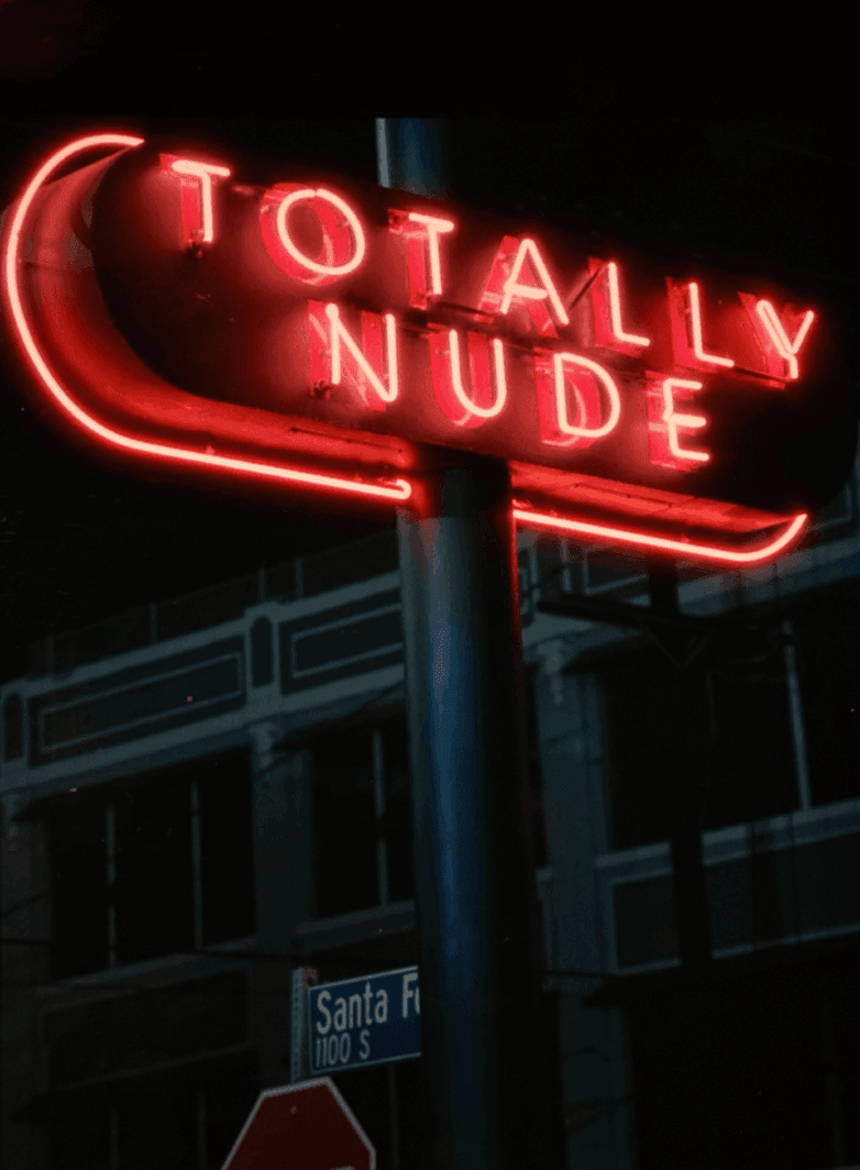 Neon sign that reads ‘Totally nude’